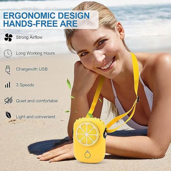 A girl at the beach wearing a Portable Citrus Neck Fan with an ergonomic, hands-free design on her neck strap