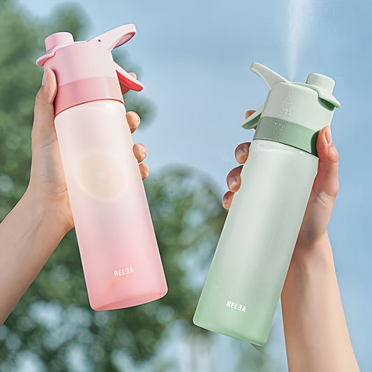 Two hands holding pink and green misting water bottles