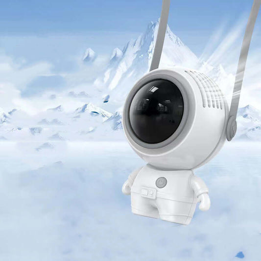 White Astronaut Portable Neck Fan against a backdrop of snowy mountains