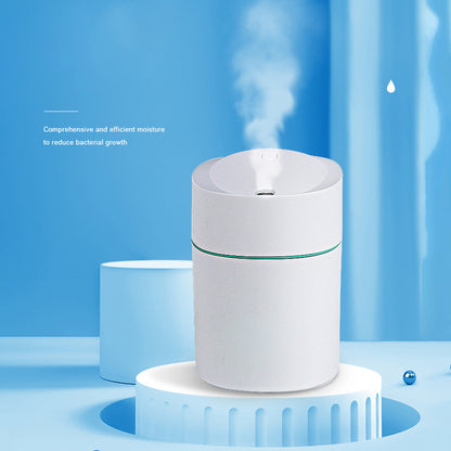White USB Desktop Humidifier with LED Night Light on a blue background
